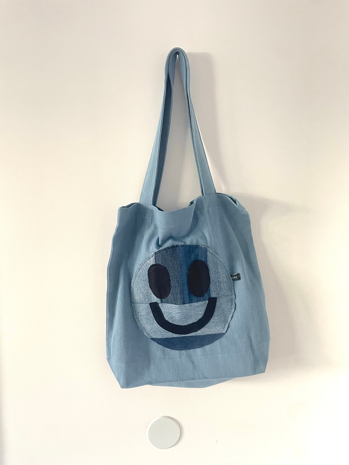 smiley face denim tote