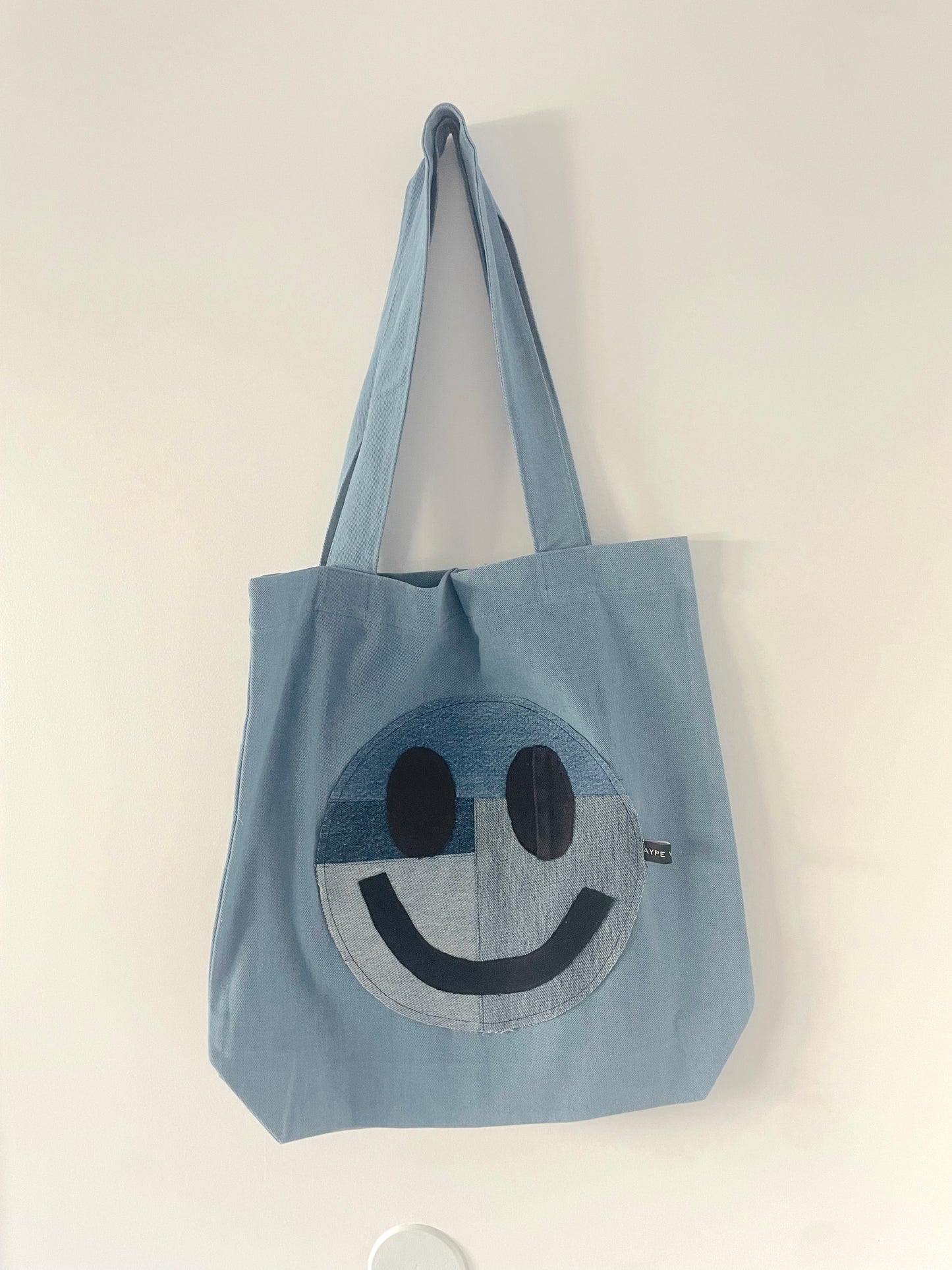 smiley face denim tote
