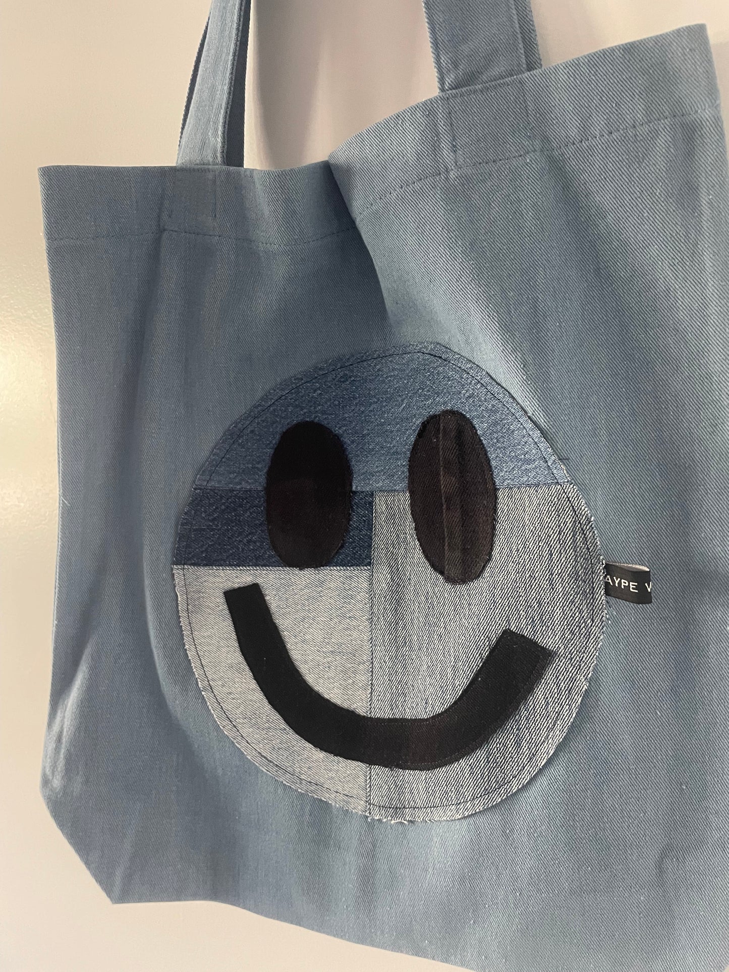 smiley face denim tote